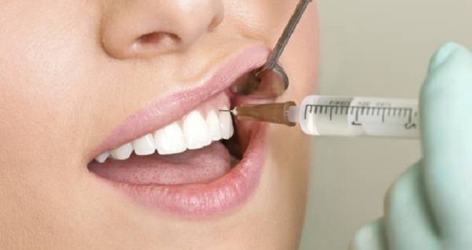 بهترین دندانپزشک درمان ریشه در مشهد کیست؟