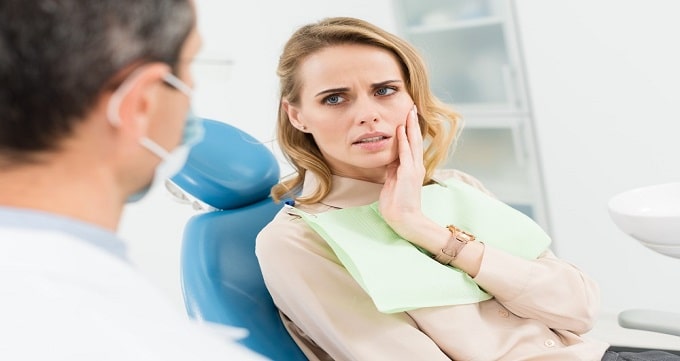 برای پر کردن دندان به چه دکتری مراجعه کنیم؟